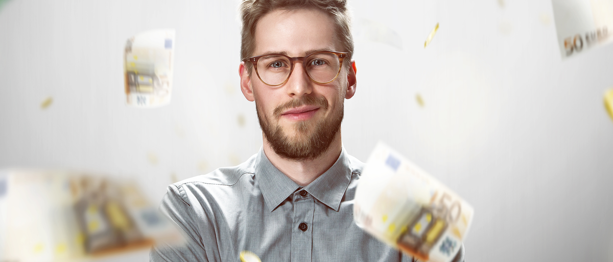Mann um den Geld schwebt,Geld,kaufmännisch,Finanzen,Finanzierung
