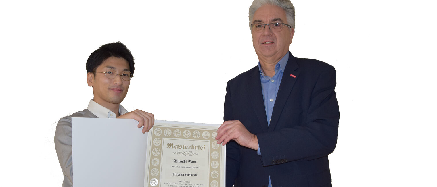 Fleischermeister Hiroshi Tani und Knut Deutscher