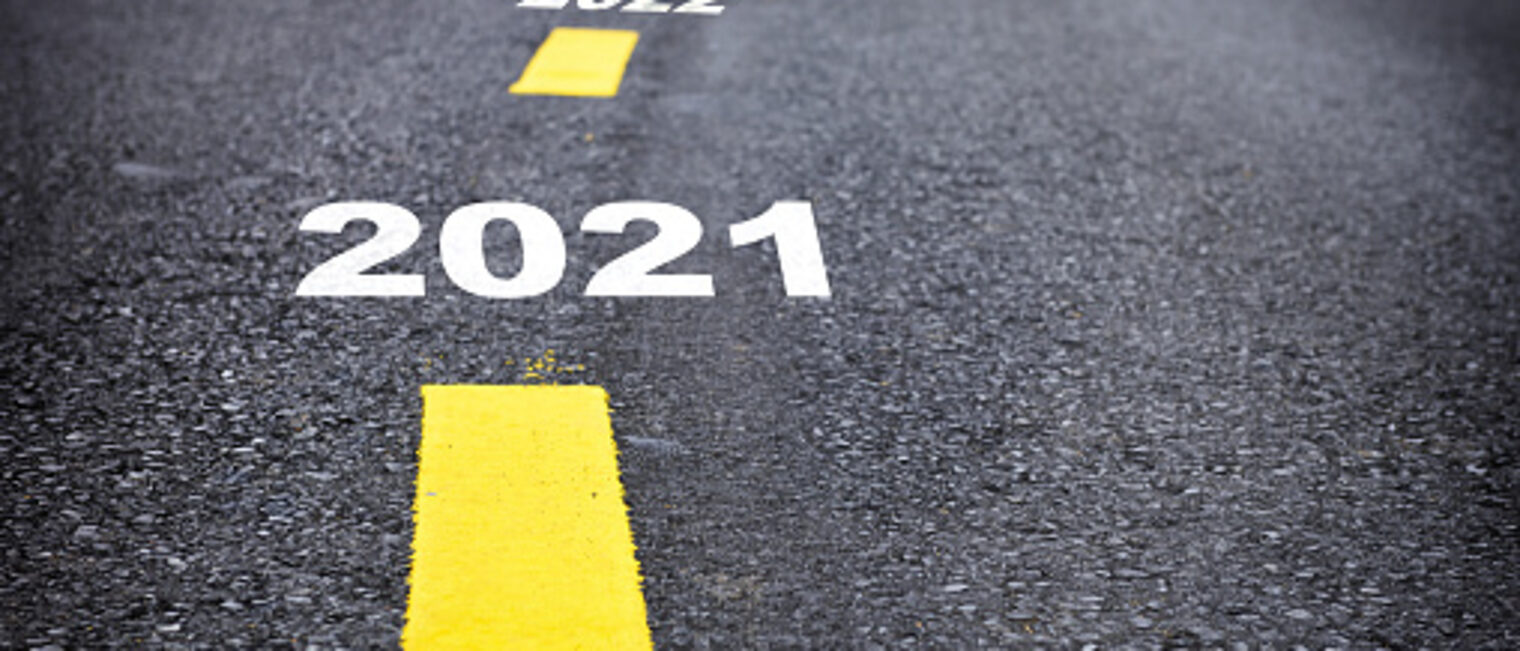 Number of 2021 to 2024 on asphalt road surface with marking lines